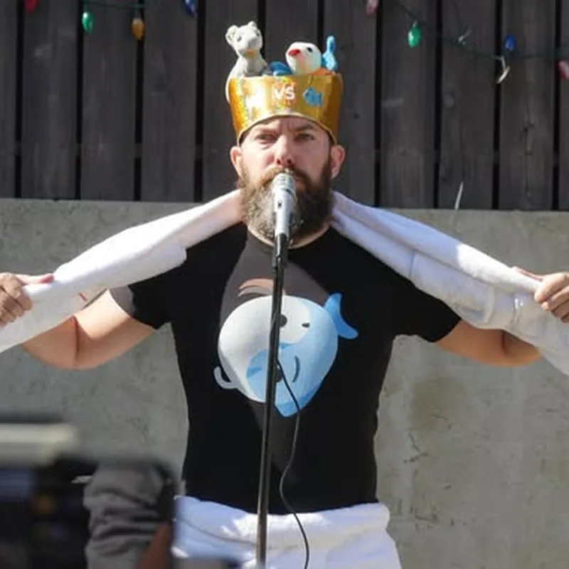 GoatVsFish in a crown preaching outdoors